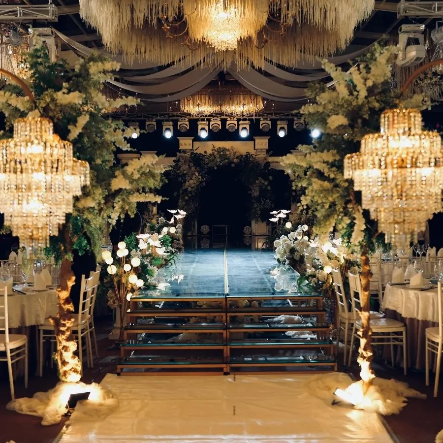 Elegant awards venue with chandeliers and grand stage setting